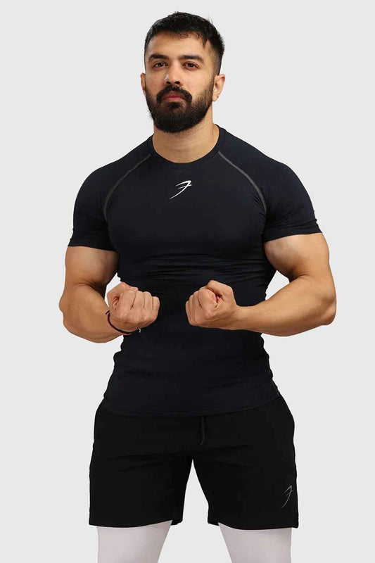 Navy compression T-shirt from Fuaark NZ, fitted men's T-shirt with stretchy fabric for athletic support and comfort.