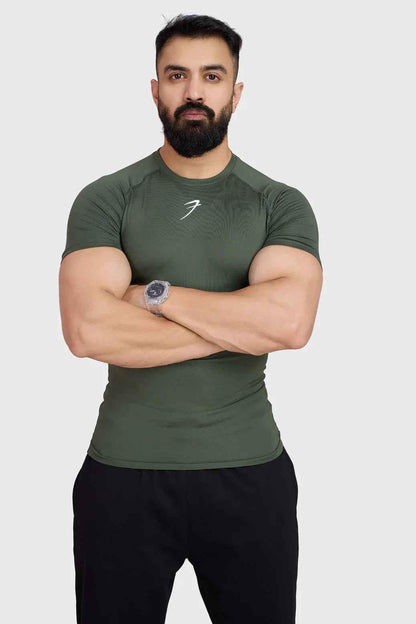 Olive Fuaark Nz compression T-shirt for men, fitted short-sleeve athletic tee with stretch fabric and logo detail.