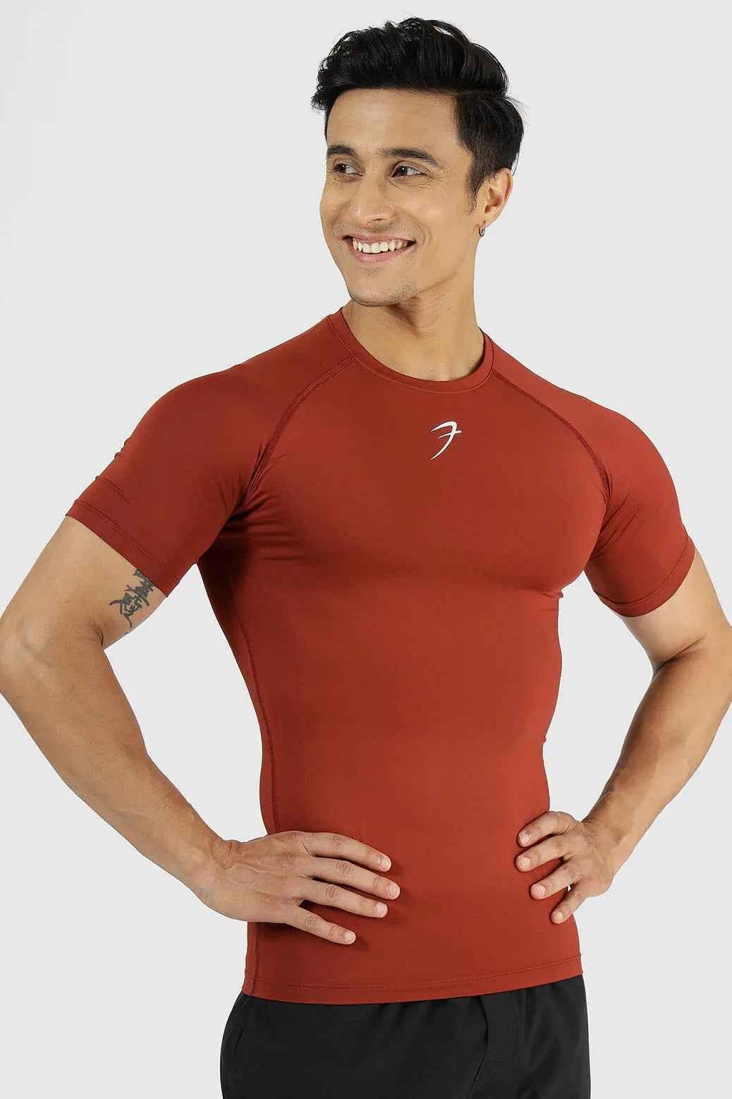 Fuaark Nz Compression T-shirt Salsa, athletic fit with vibrant salsa color, moisture-wicking fabric, designed for active wear.