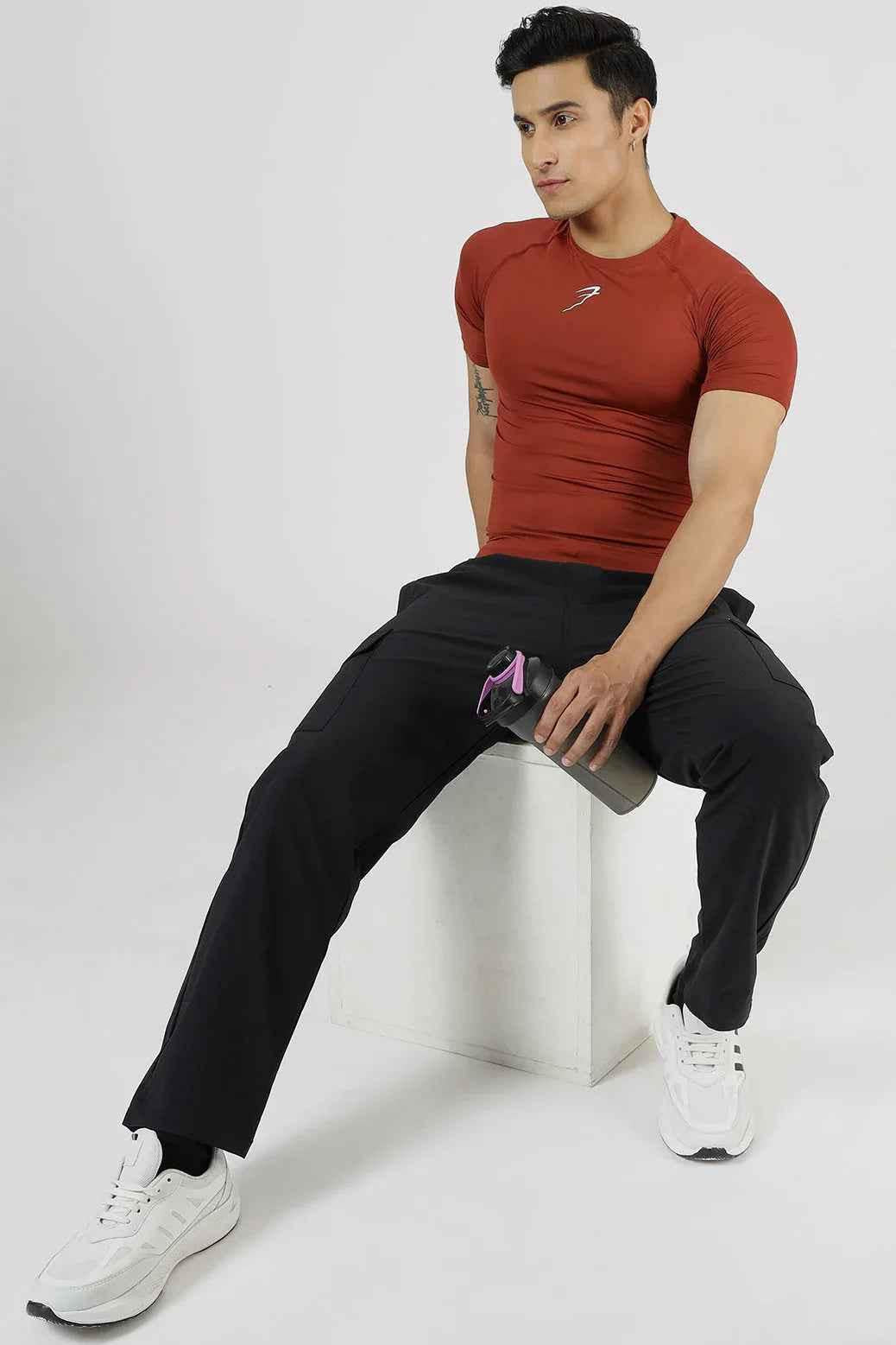 Fuaark Nz compression T-shirt Salsa, fitted athletic T-shirt with vibrant salsa color, for active wear and performance.