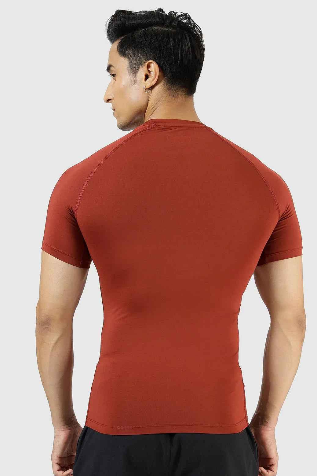 Fuaark Nz Compression T-shirt Salsa, black athletic T-shirt with fitted design, suitable for sports and active wear.