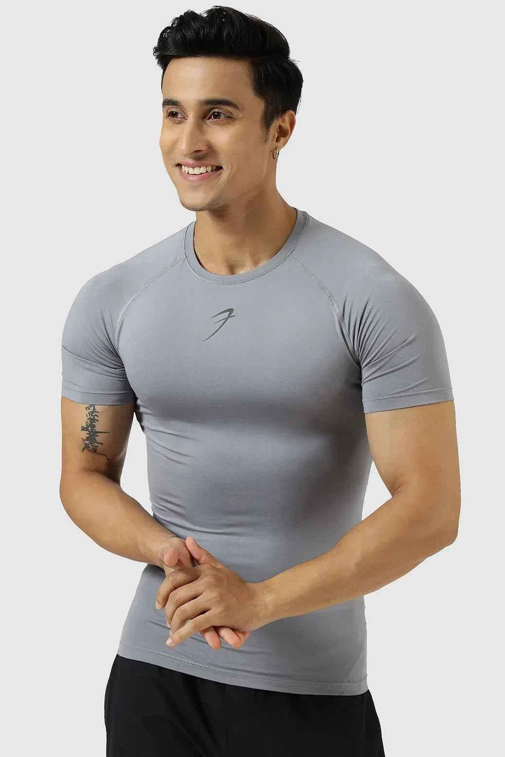 Fuaark NZ compression T-shirt in Sea Grey, close-up view showing fitted, breathable fabric for athletic performance.