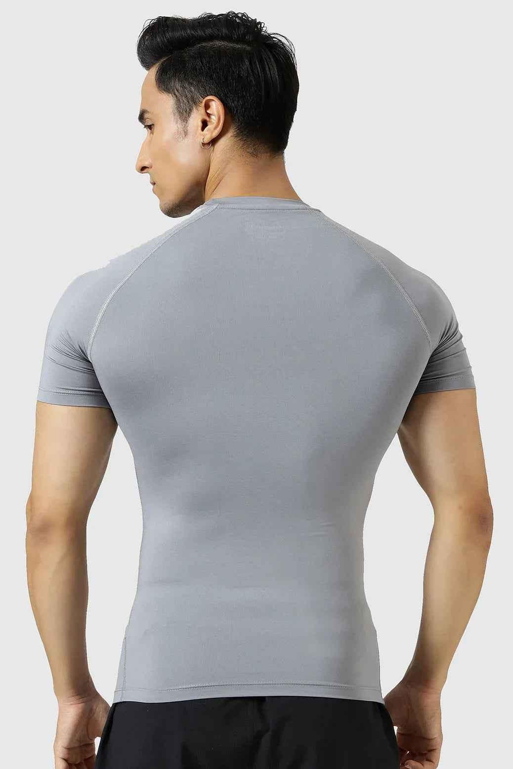 Sea grey Fuaark Nz compression T-shirt for men, showing a close-up of the fitted, high-performance athletic T-shirt.