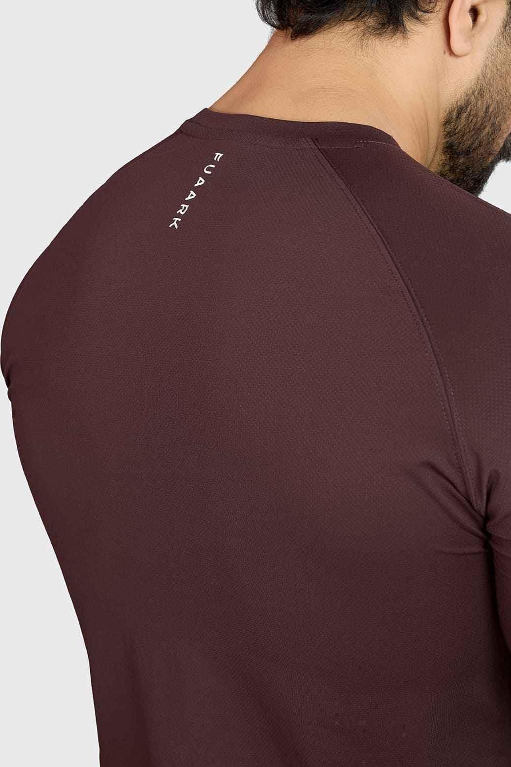 Fuaark Nz Core full-sleeves brown T-shirt showing a casual fit and long sleeves on a plain background.