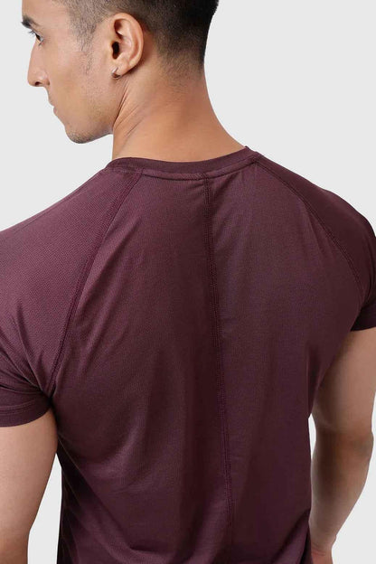 Fuaark Nz Dash T-shirt in Raisin color, featuring a casual fit and soft fabric, displayed on a plain background.
