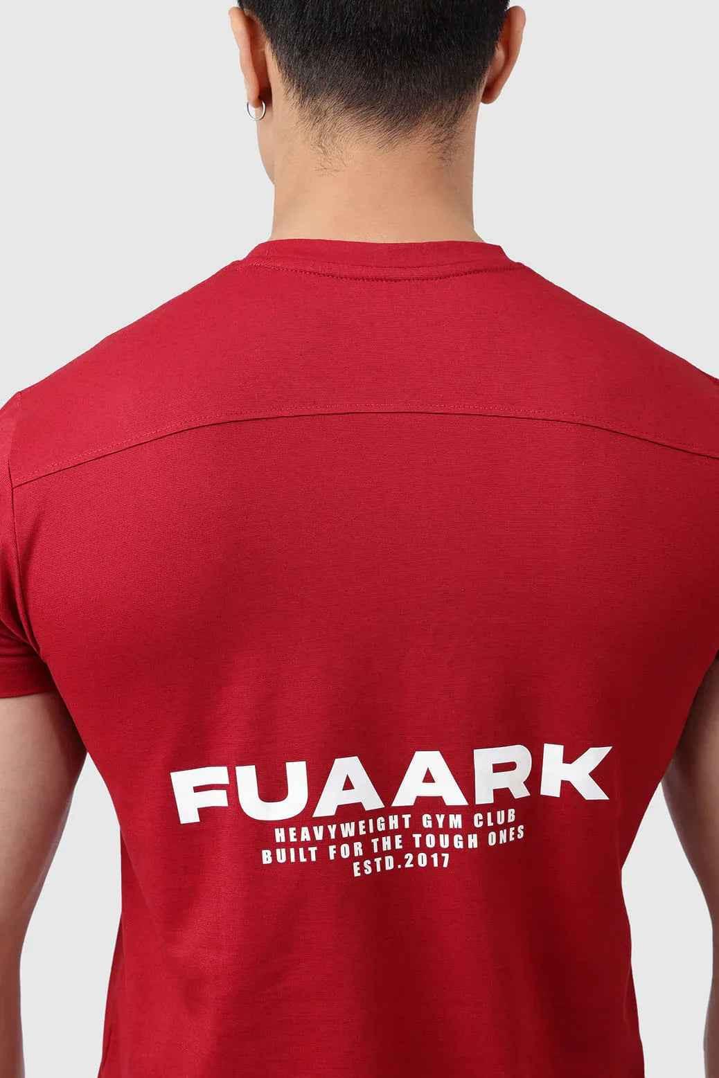 Deep red Pulse T-shirt by Fuaark Nz featuring bold style and comfortable fit, shown on a model.
