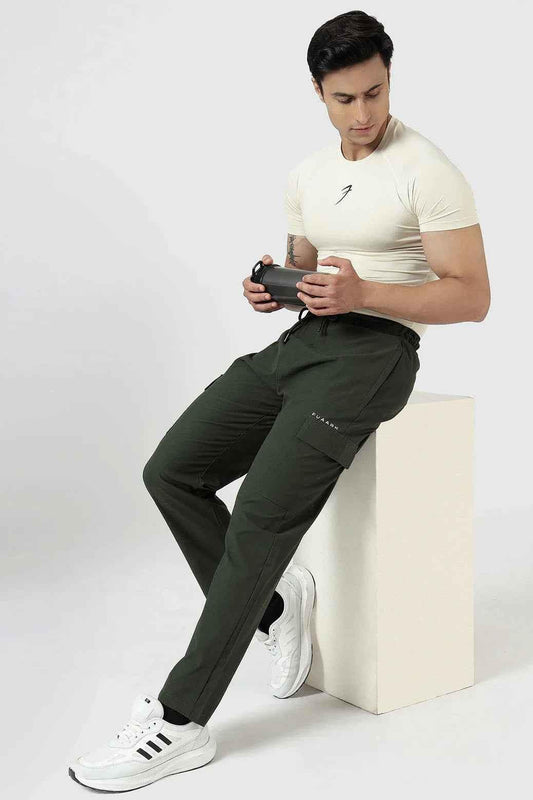 Beige Fuaark Nz compression T-shirt for athletic performance, featuring a snug fit and breathable fabric.