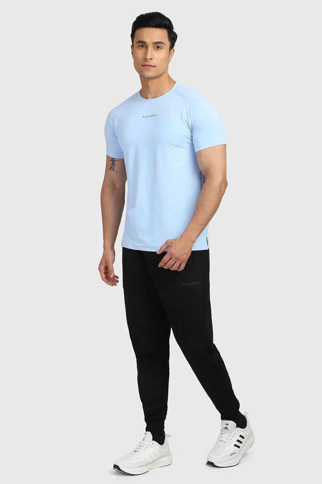 Sky blue Fuaark Nz T-shirt displayed flat, showcasing a sleek design perfect for elevating your casual style.