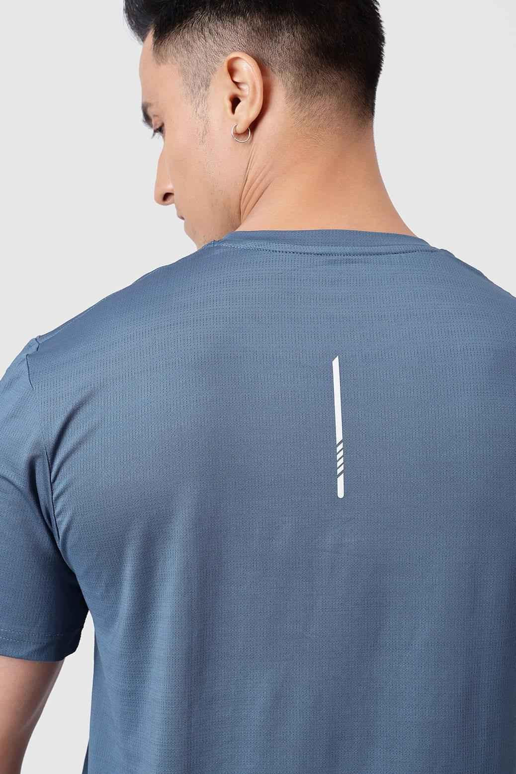 Fuaark Nz Ember Light Blue running T-shirt for ultimate performance, shown on a mannequin with athletic fit and breathable fabric