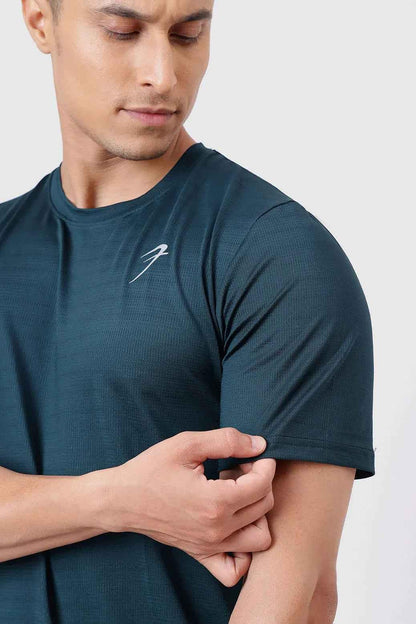 Fuaark Nz Ember Running T-shirt in bottle green, showing a comfortable, fitted athletic t-shirt for running and casual wear.