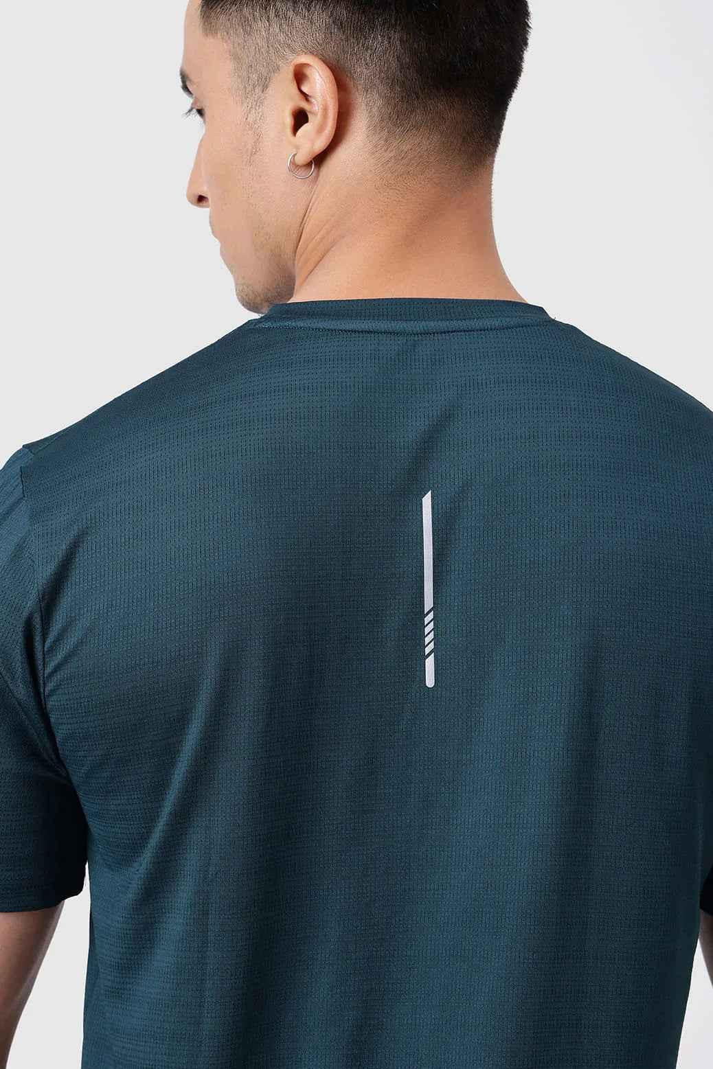 Fuaark Nz Ember Running T-shirt in bottle green, casual fit, soft fabric, displayed flat on a white background.