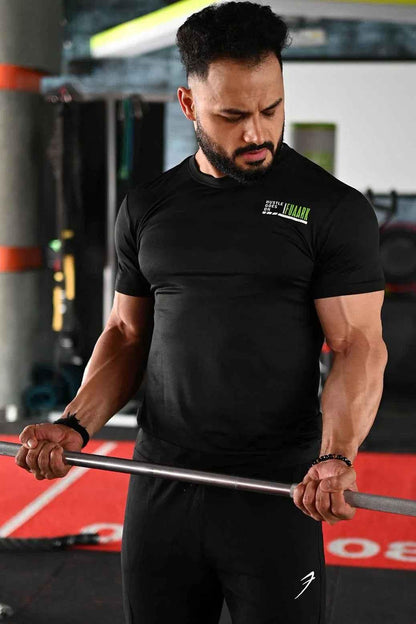 Black T-shirt from Fuaark Nz featuring a bold emblem design on the front. Made from comfortable, casual fabric.