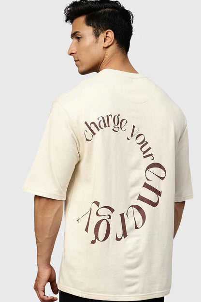 Beige oversized T-shirt from Fuaark Nz, casual fit, soft fabric, and relaxed style, shown on a plain background.