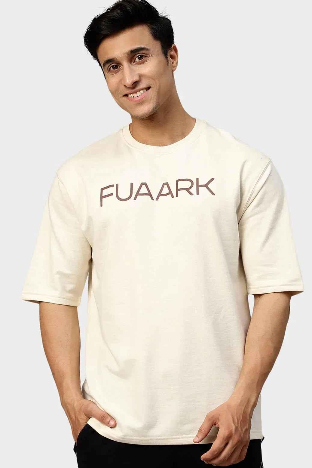 Beige oversized T-shirt from Fuaark Nz featuring a relaxed fit and soft fabric for casual wear.