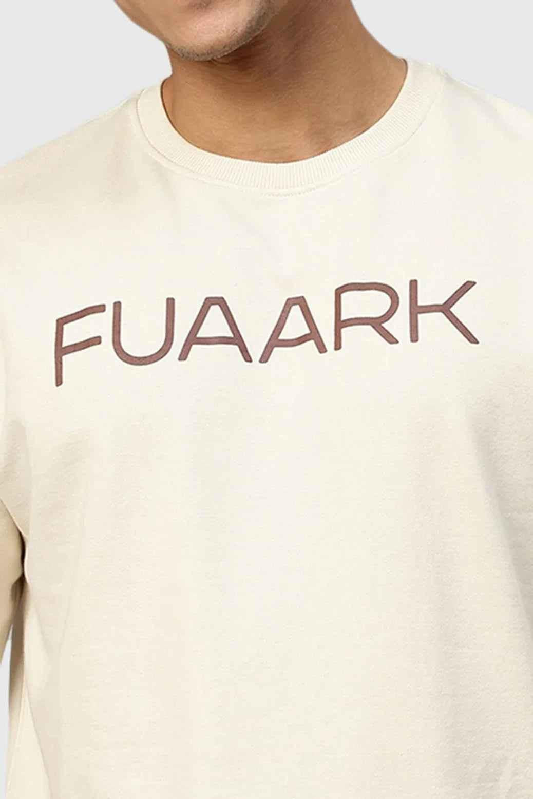 Beige oversized T-shirt from Fuaark Nz with a relaxed fit, casual style, and soft fabric, perfect for everyday wear.