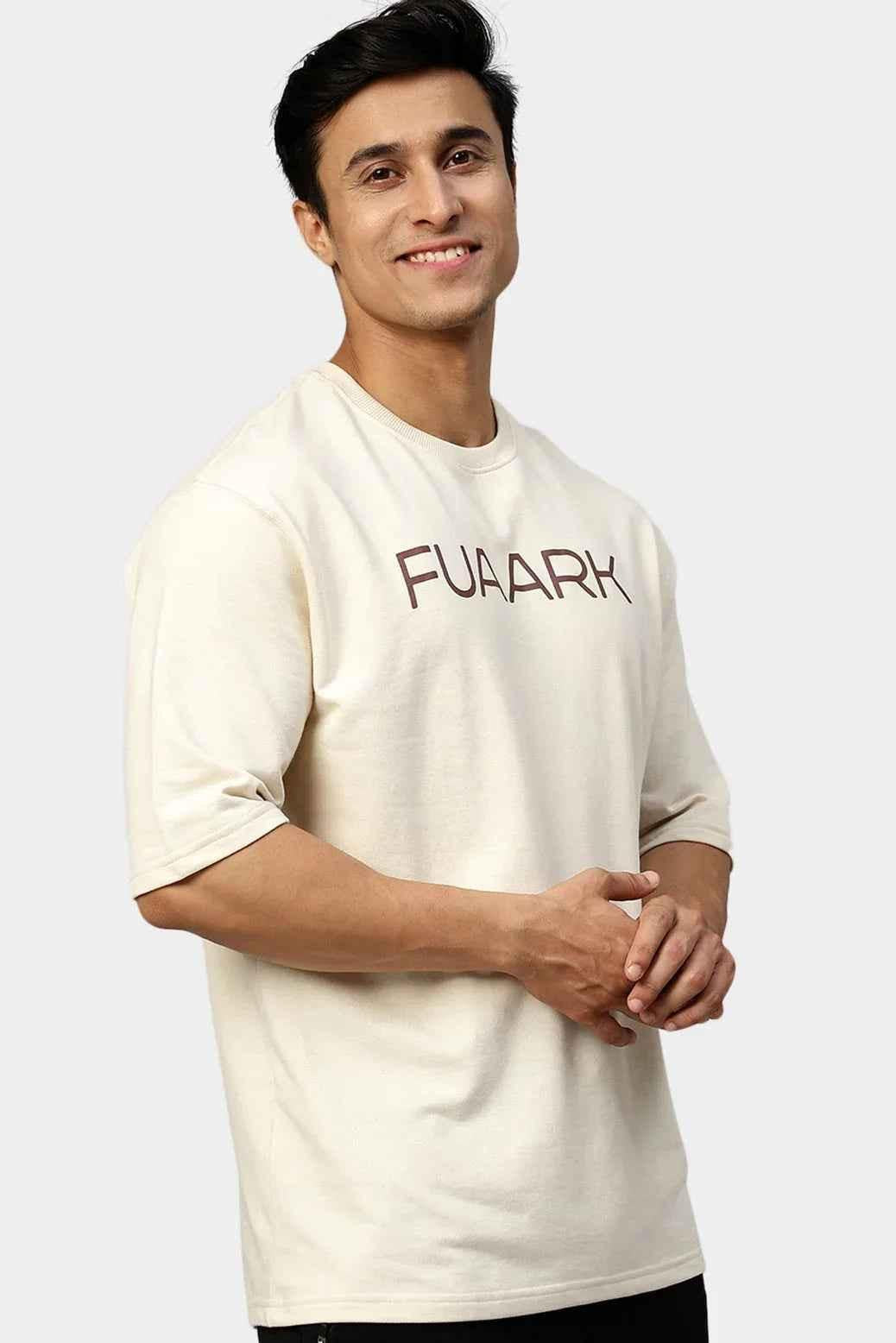 Beige oversized energy T-shirt by Fuaark Nz, featuring a relaxed fit and casual style in a soft, comfortable fabric.