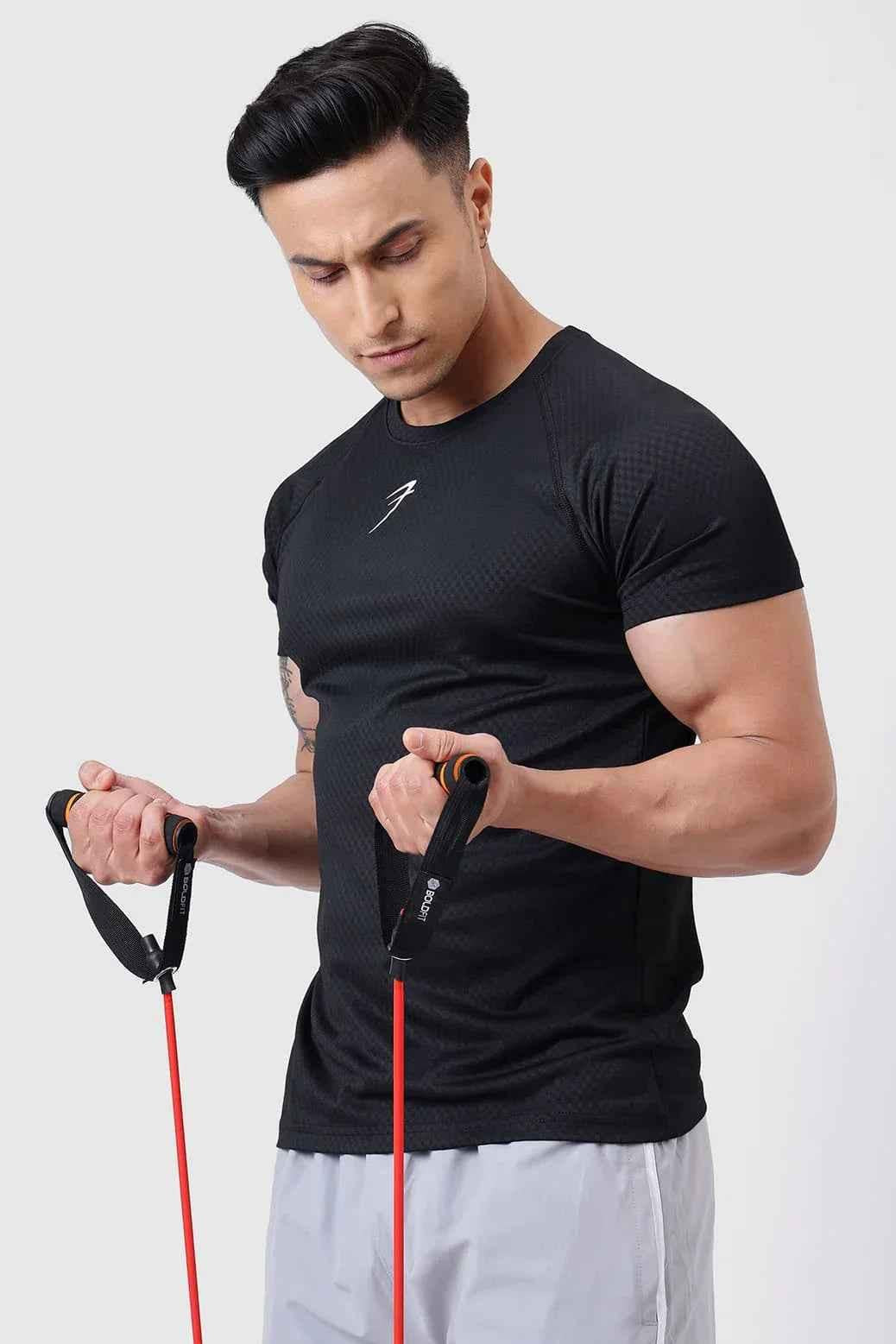 Black T-shirt by Fuaark NZ featuring a grain texture, designed for ultimate comfort and casual style.