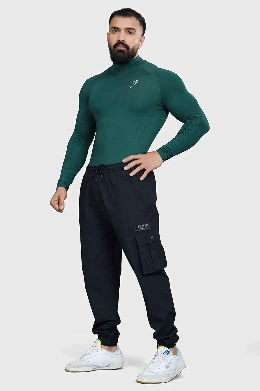 Emerald high neck compression full sleeves T-shirt by Fuaark NZ, showcasing a fitted athletic design and smooth fabric.