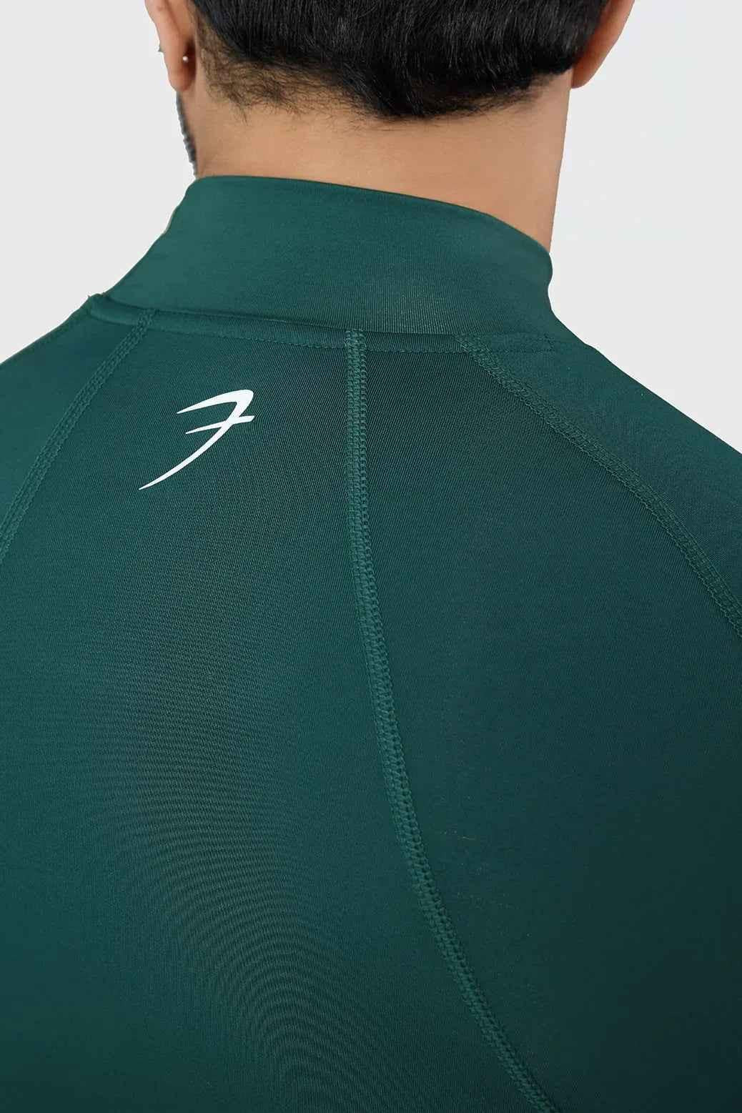 Emerald high-neck compression full-sleeves T-shirt by Fuaark Nz, designed for athletic support and stylish fit.