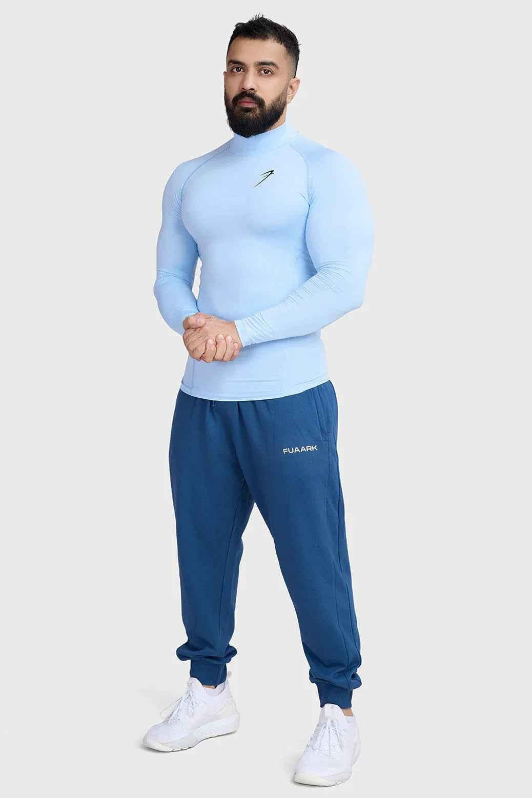 Fuaark Nz high neck compression full sleeves T-shirt in glacial blue, showcasing a snug fit and sleek design.