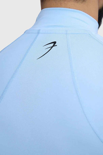Fuaark Nz high neck compression full sleeves T-shirt in glacial blue, close-up of fitted, athletic design and fabric texture.