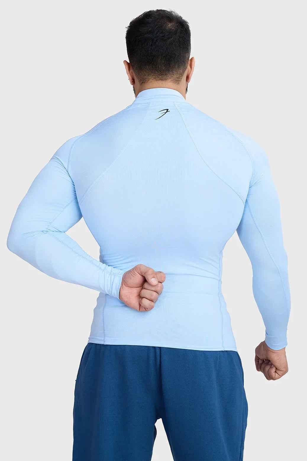 Fuaark Nz high neck compression full sleeves T-shirt in glacial blue, designed for comfort and sporty style.