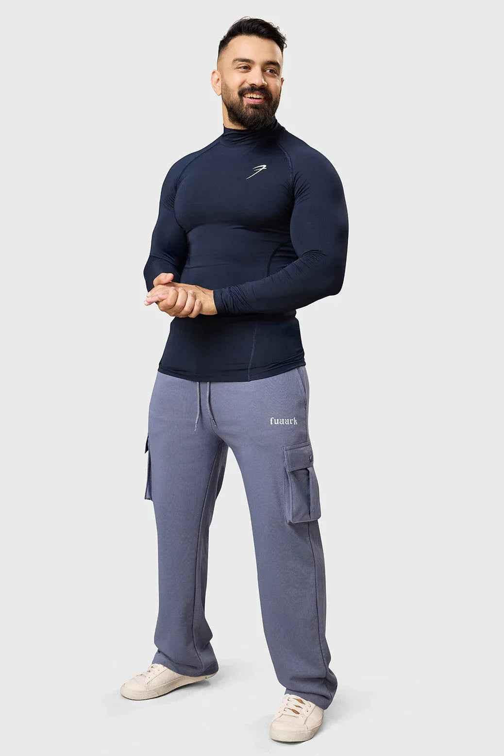 Navy high neck compression full sleeves T-shirt by Fuaark Nz, made from stretchy fabric for athletic and casual wear.