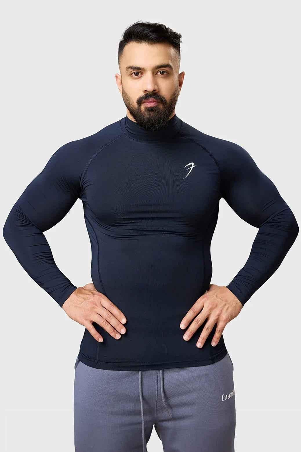 Navy high neck compression full sleeves T-shirt by Fuaark Nz, showcasing a fitted design and smooth fabric.