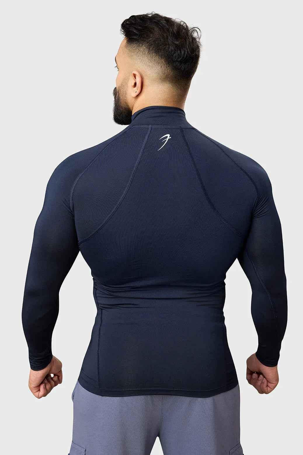 Fuaark Nz navy high neck compression full sleeves T-shirt, close-up showing fitted design and smooth fabric.