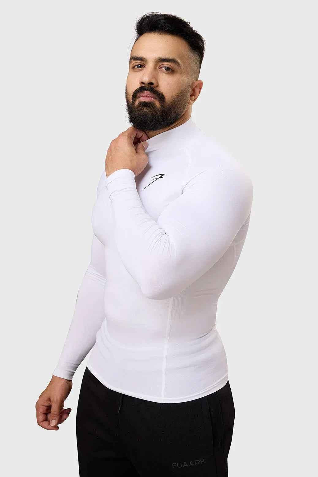 White high-neck compression full-sleeve T-shirt by Fuaark Nz, showcasing sleek fit and smooth fabric for active wear.