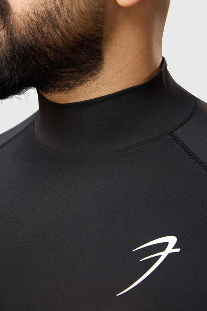 Black high-neck compression T-shirt by Fuaark NZ, showcasing a snug fit and smooth fabric for athletic support and comfort.
