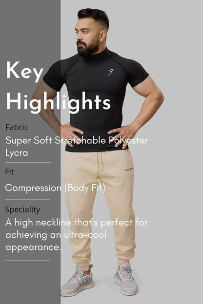 Black high neck compression T-shirt by Fuaark NZ, showing close-up of fitted, stretchy fabric and sleek design.