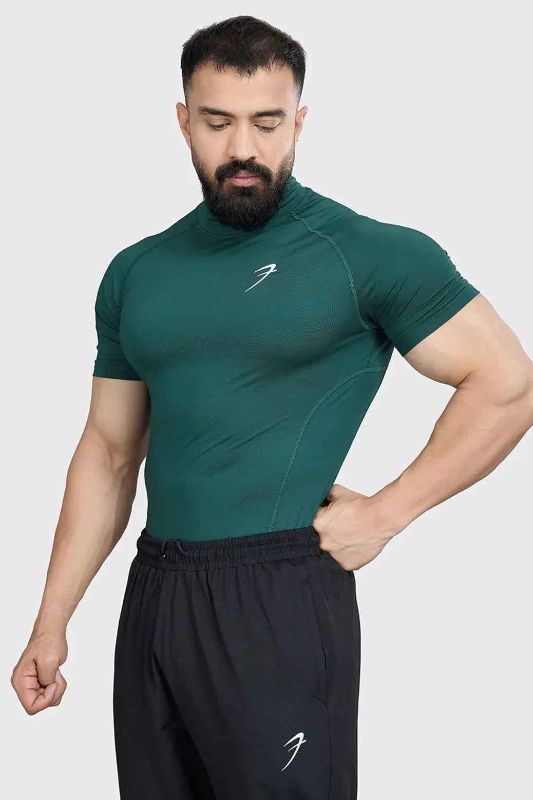 Emerald high neck compression T-shirt by Fuaark Nz, close-up view of the fitted, stretchy fabric and sleek design.