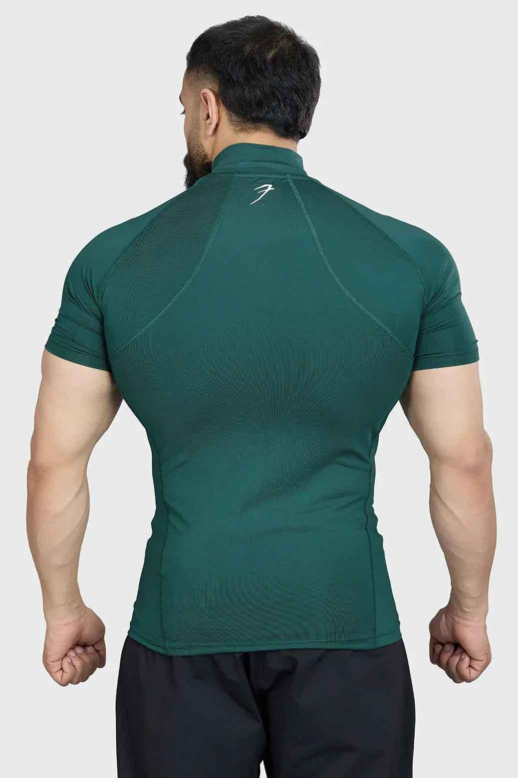 Emerald high neck compression T-shirt by Fuaark Nz, made from stretchy fabric, designed for support and comfort.