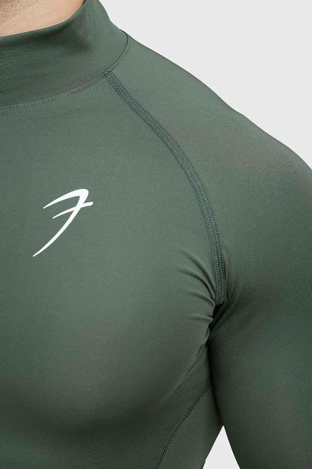 Fuaark Nz high neck compression T-shirt with full sleeves in olive, designed for support and athletic wear.