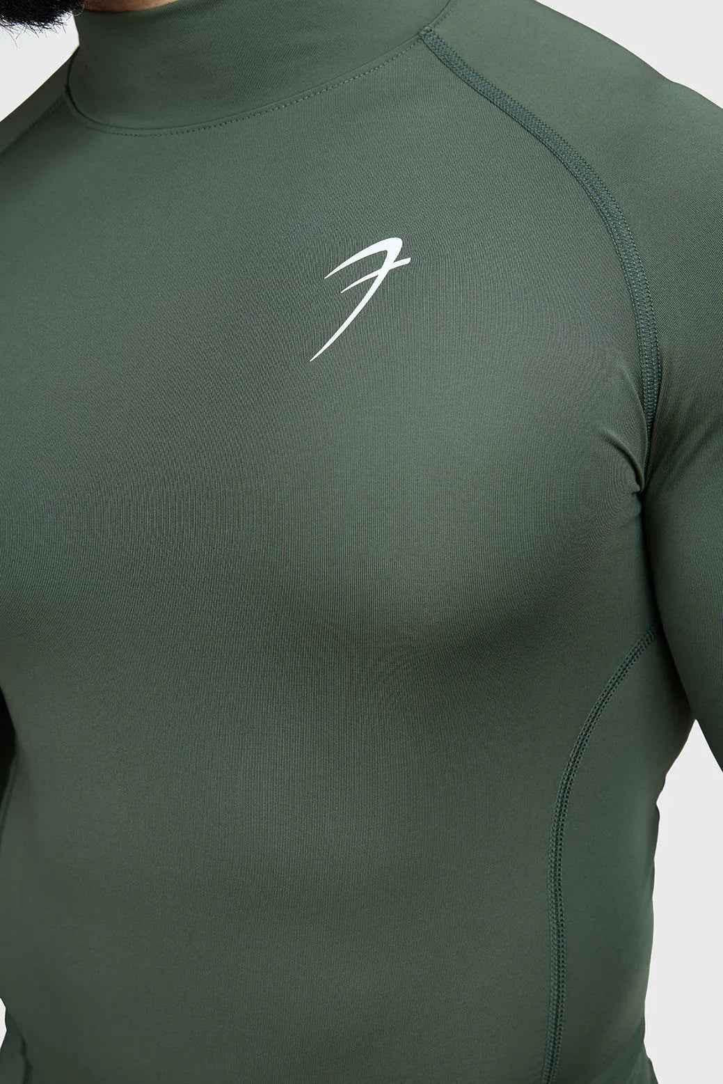 Fuaark NZ high neck compression T-shirt with full sleeves in olive color, designed for athletic or casual wear.