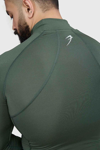 Fuaark Nz high neck compression T-shirt with full sleeves in olive, close-up of soft fabric and snug fit on mannequin.