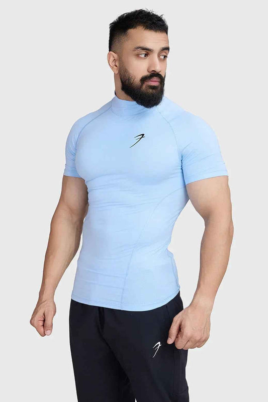 Fuaark Nz high neck compression T-shirt in Glacial Blue, close-up view highlighting stretchy fabric and fitted design.