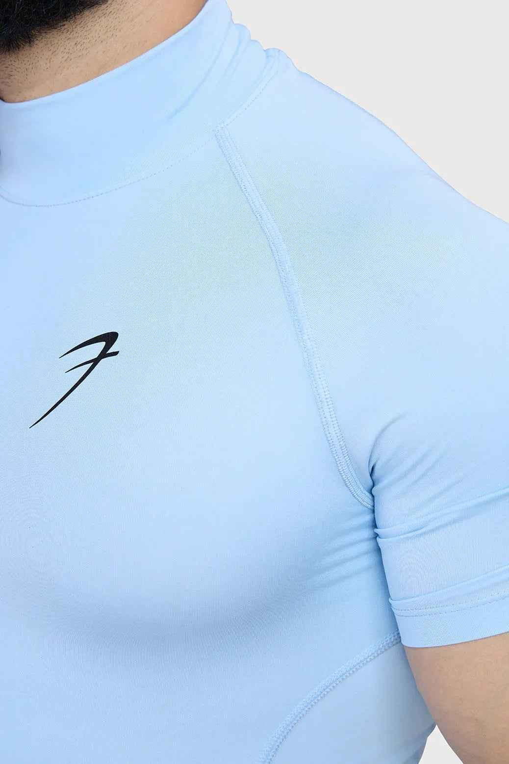 Fuaark Nz high neck compression T-shirt in Glacial Blue, showcasing a close-up of the fitted athletic shirt with sleek fabric.