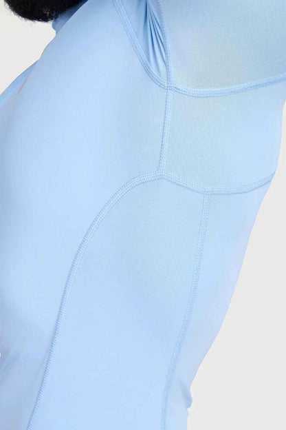 Fuaark Nz high neck compression T-shirt in Glacial Blue, close-up showing fitted design and soft fabric texture.