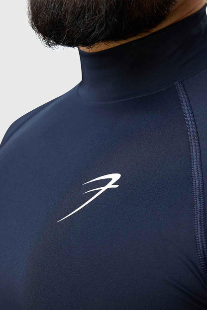 Navy high neck compression T-shirt by Fuaark Nz, close-up of the fitted, stretchy fabric and high collar design.