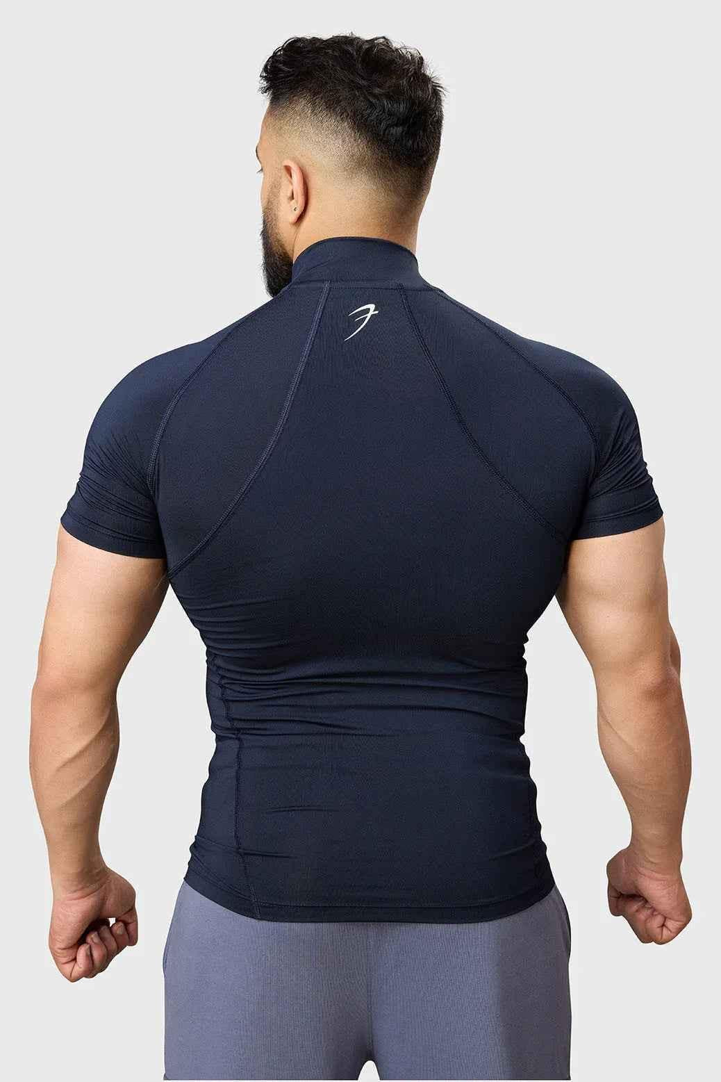 Navy high neck compression T-shirt by Fuaark NZ, featuring a snug fit and sleek design for athletic wear.