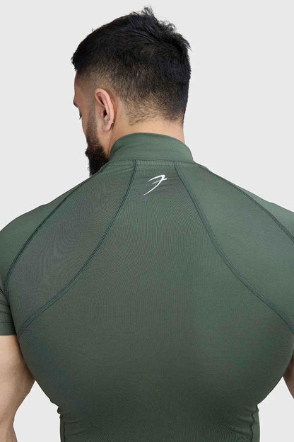 Olive high neck compression T-shirt by Fuaark NZ, fitted and stretchy, designed for support and comfort.