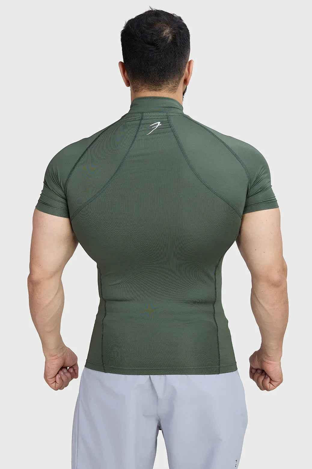 Olive high neck compression T-shirt by Fuaark Nz, close-up of fabric and fitted design.