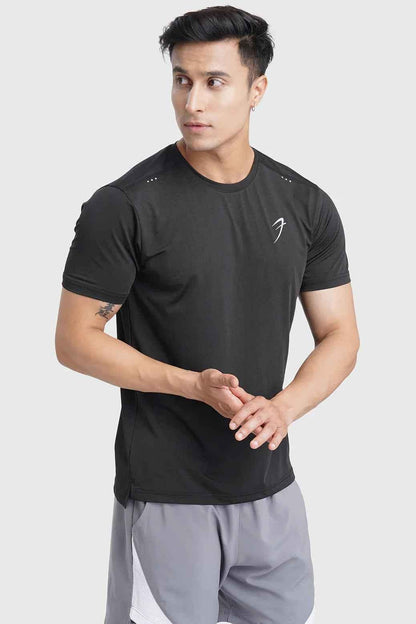 Black laser cut running T-shirt by Fuaark Nz featuring stylish cut-out details and breathable fabric for active wear.