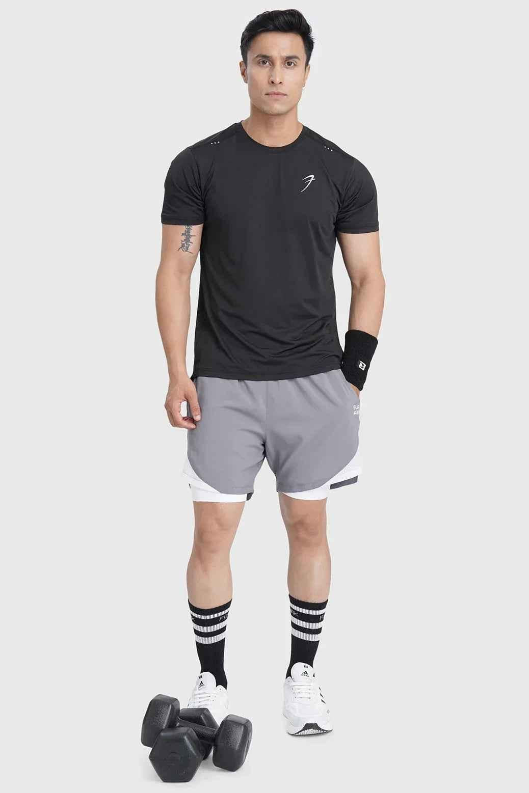 Black laser-cut running T-shirt by Fuaark Nz, featuring breathable fabric and stylish laser-cut detailing.