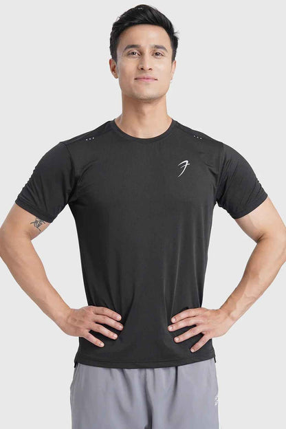 Black laser cut running T-shirt by Fuaark NZ, showing detailed laser cut design and breathable fabric on a mannequin.