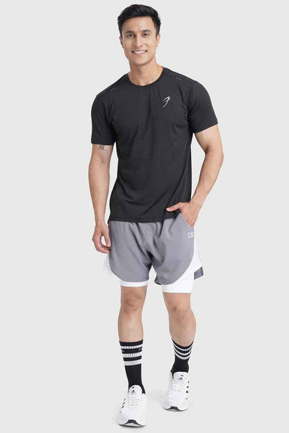 Black laser-cut running T-shirt by Fuaark NZ, showing close-up of detailed laser cut design on breathable athletic T-shirt.