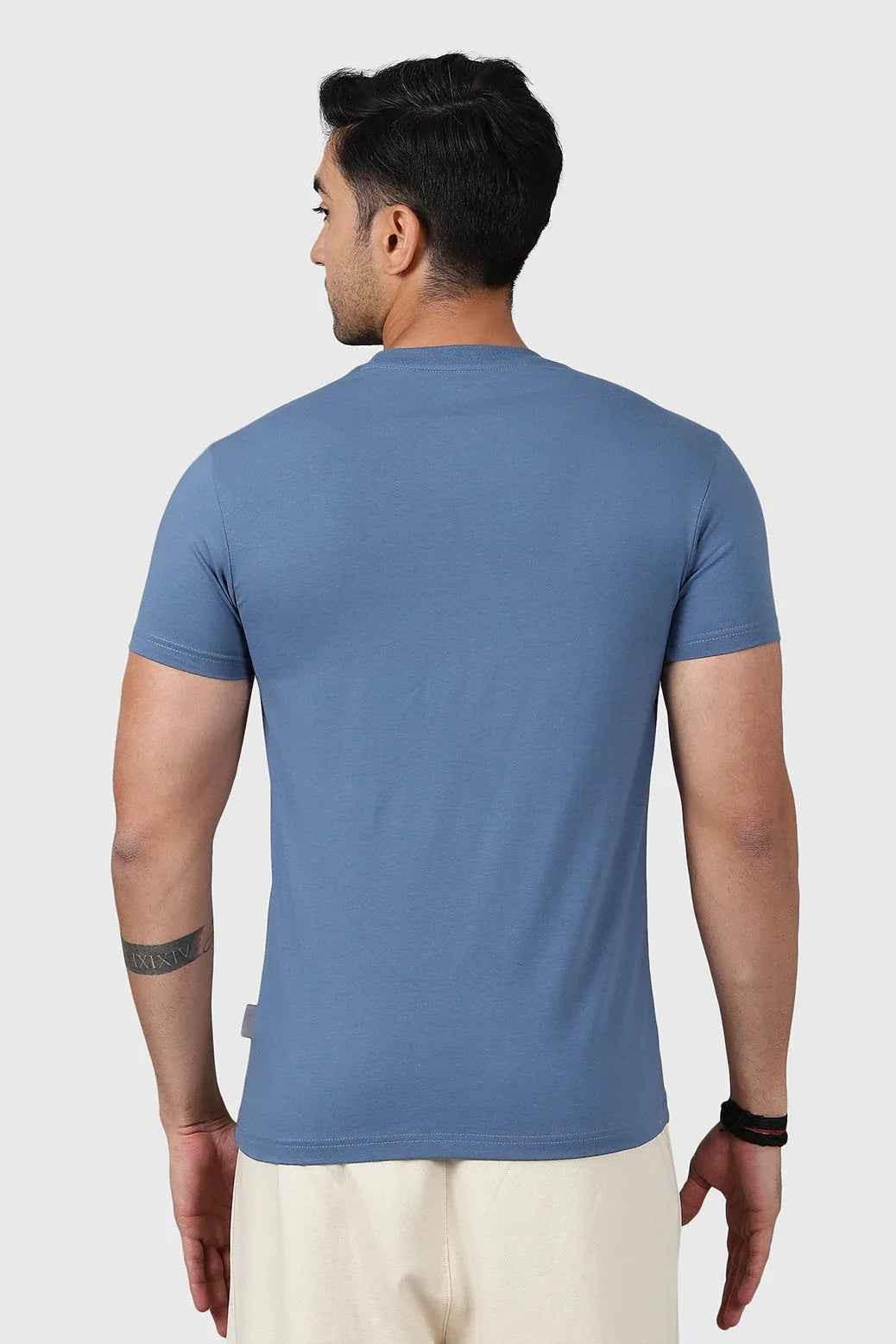 Fuaark Nz Legacy Crew Neck T-shirt in Dusk Blue, showing the soft fabric and classic fit on a model.