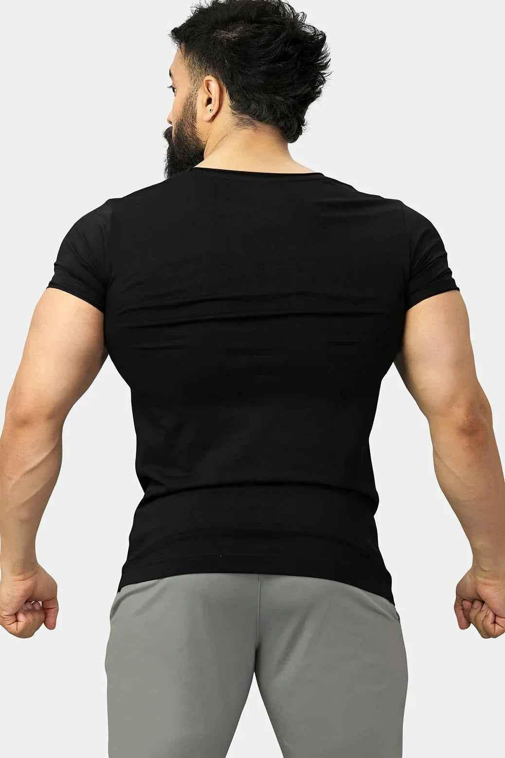 Black Fuaark Nz Legacy Scoop Neck T-shirt displayed on a hanger with a close-up of the fabric and neckline.